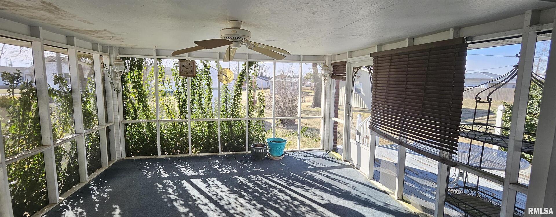103 David Drive McClure, IL 62957 - Photo 6 of 13 a view of a back yard from a patio