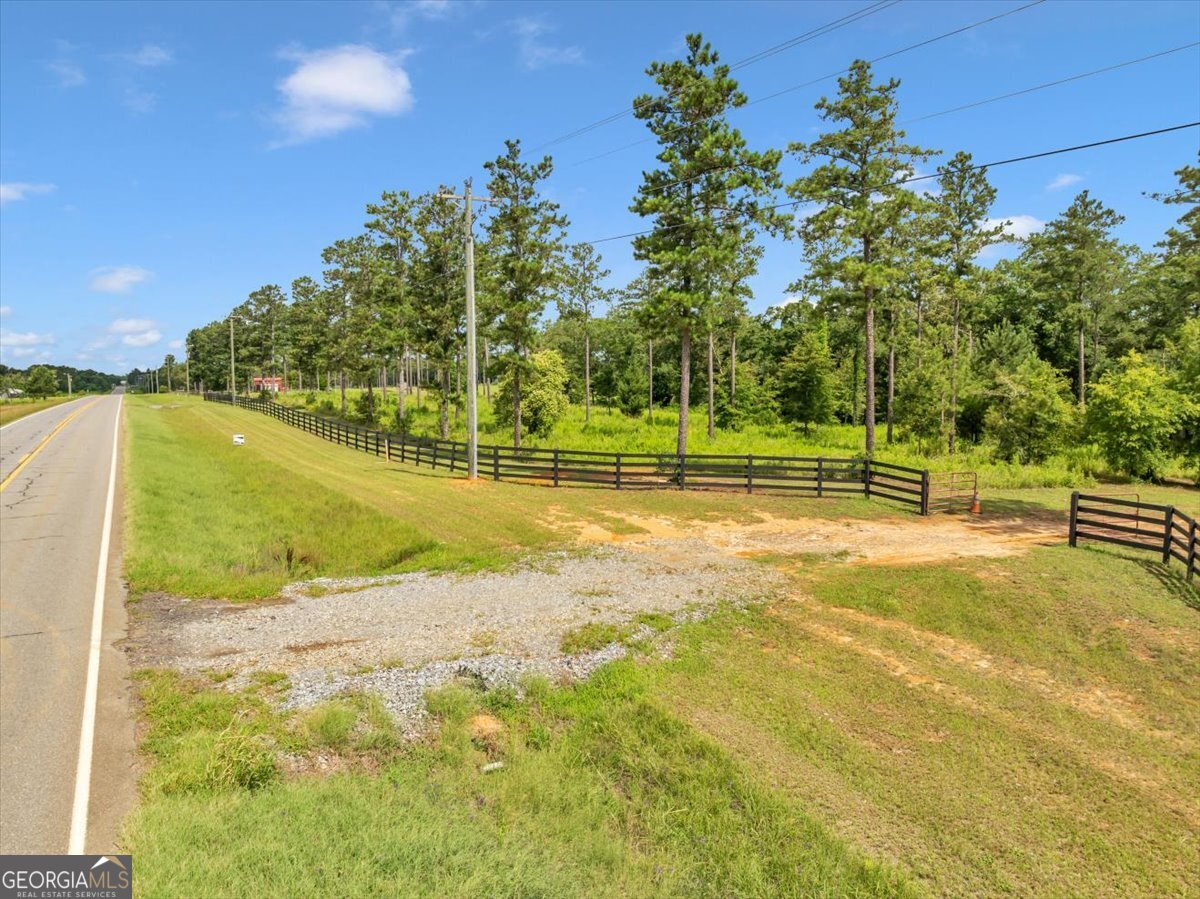 335 Highway 26 Elko, GA 31025 - Photo 24 of 54 a view of a swimming pool with a yard