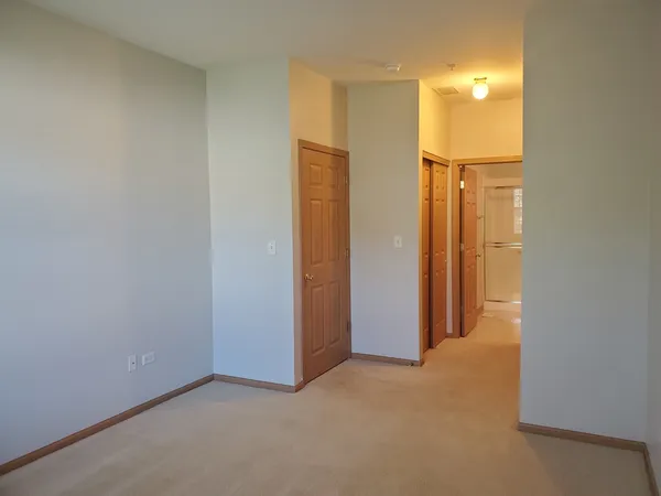 a view of a room with a hallway