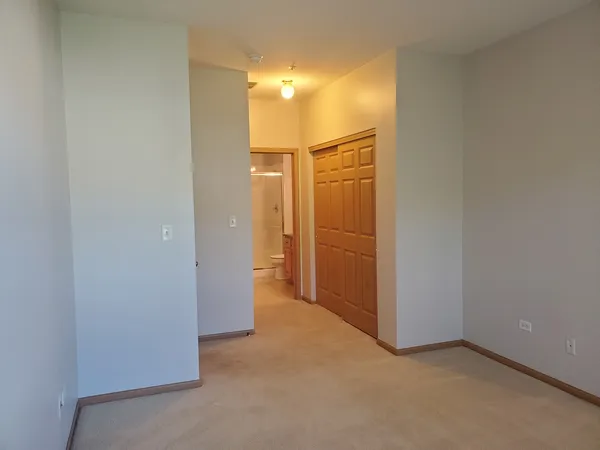 a bathroom with a shower and a toilet