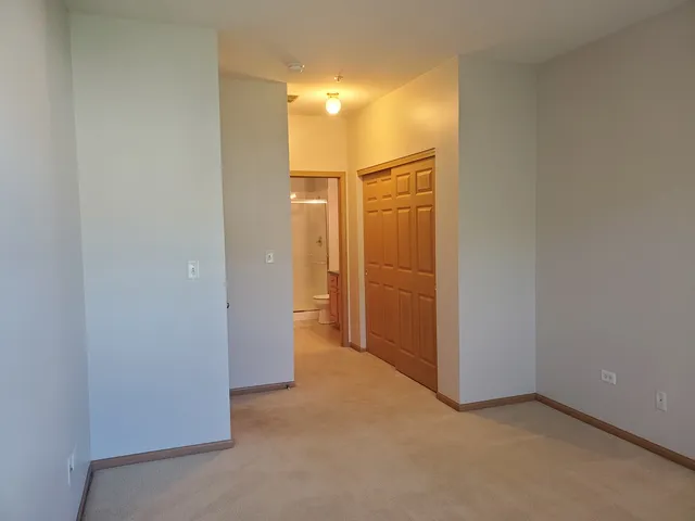 a bathroom with a shower and a toilet
