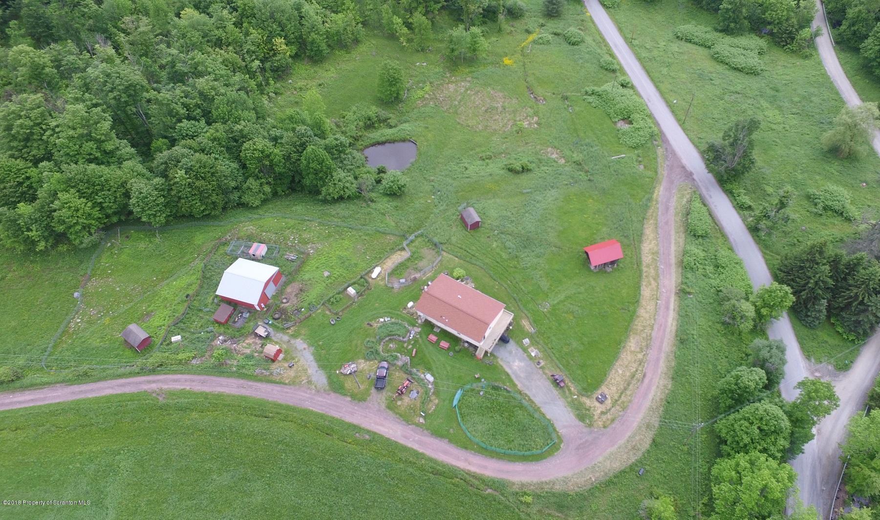 138 Pine Mill Road Honesdale, PA 18431 - Photo 1 of 54 a bird view of a lake