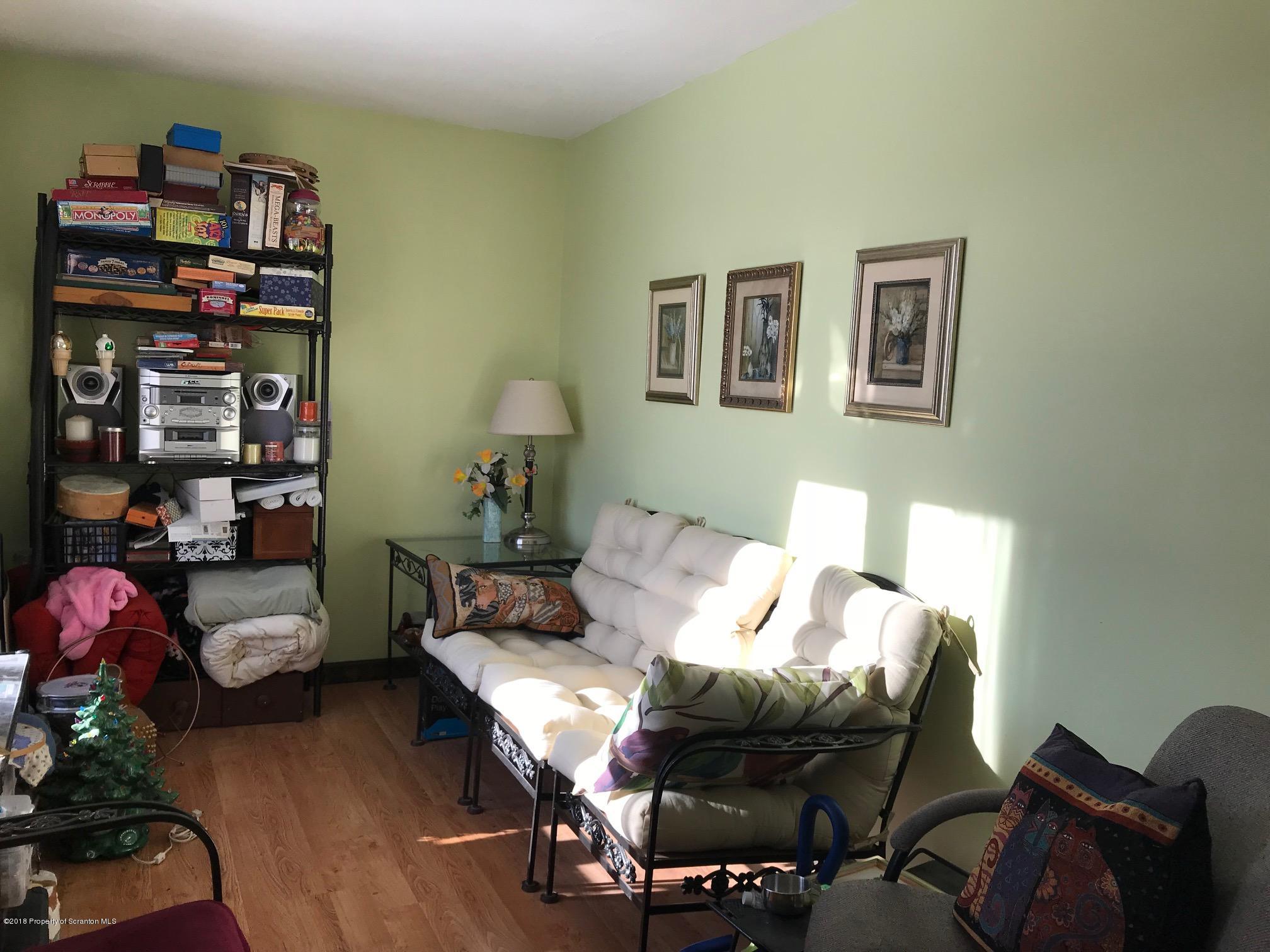 138 Pine Mill Road Honesdale, PA 18431 - Photo 8 of 54 a living room with furniture and wooden floor