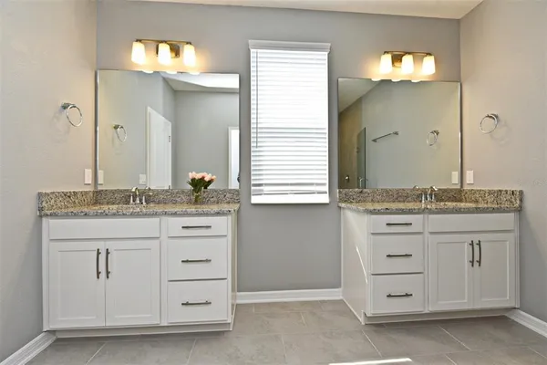 a bathroom with a shower and a bathtub