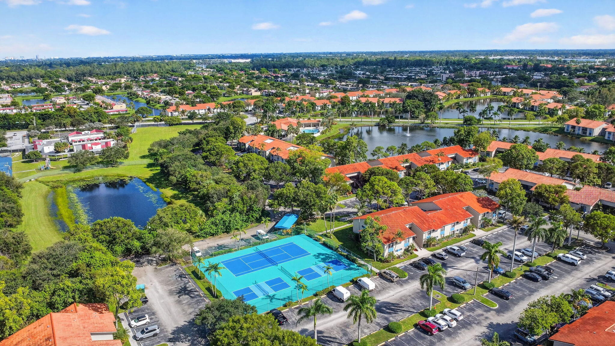 1400 Windorah Way, Unit G West Palm Beach, FL 33411 - Photo 39 of 41 Aerial of Tennis