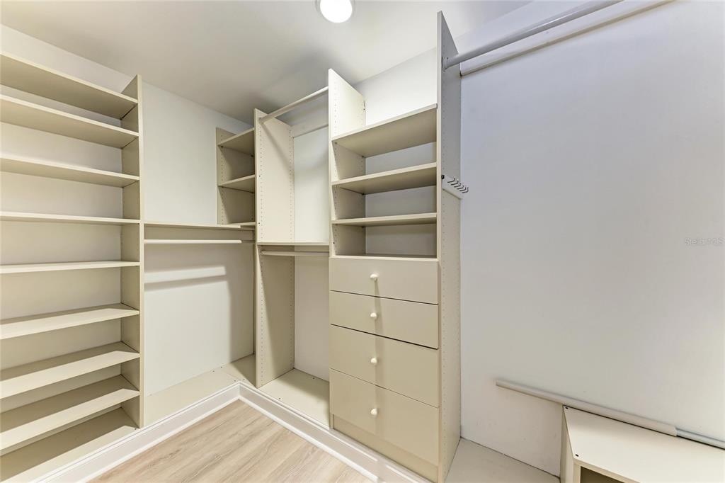 3291 Bayou Road Longboat Key, FL 34228 - Photo 15 of 41 a view of walk in closet with empty racks