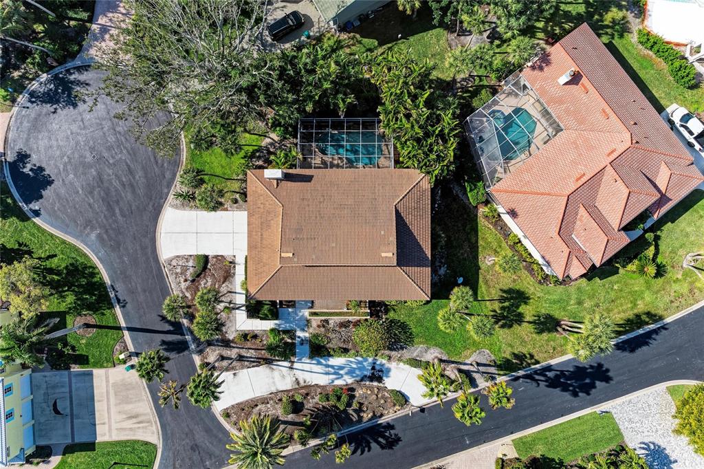 3291 Bayou Road Longboat Key, FL 34228 - Photo 27 of 41 an aerial view of a house with a yard and sitting area