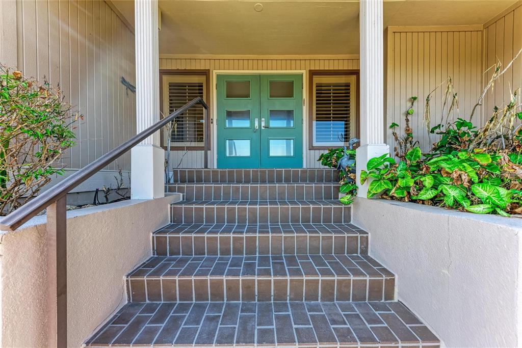 3291 Bayou Road Longboat Key, FL 34228 - Photo 3 of 41 a view of outdoor space with deck and tree
