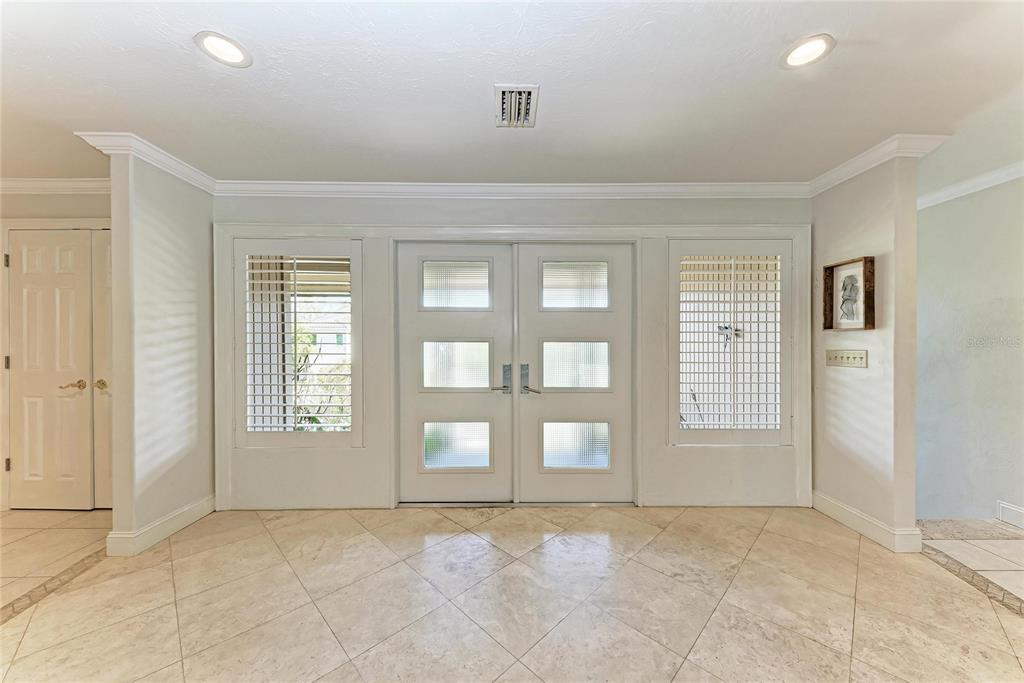 3291 Bayou Road Longboat Key, FL 34228 - Photo 4 of 41 a view of an empty room with windows