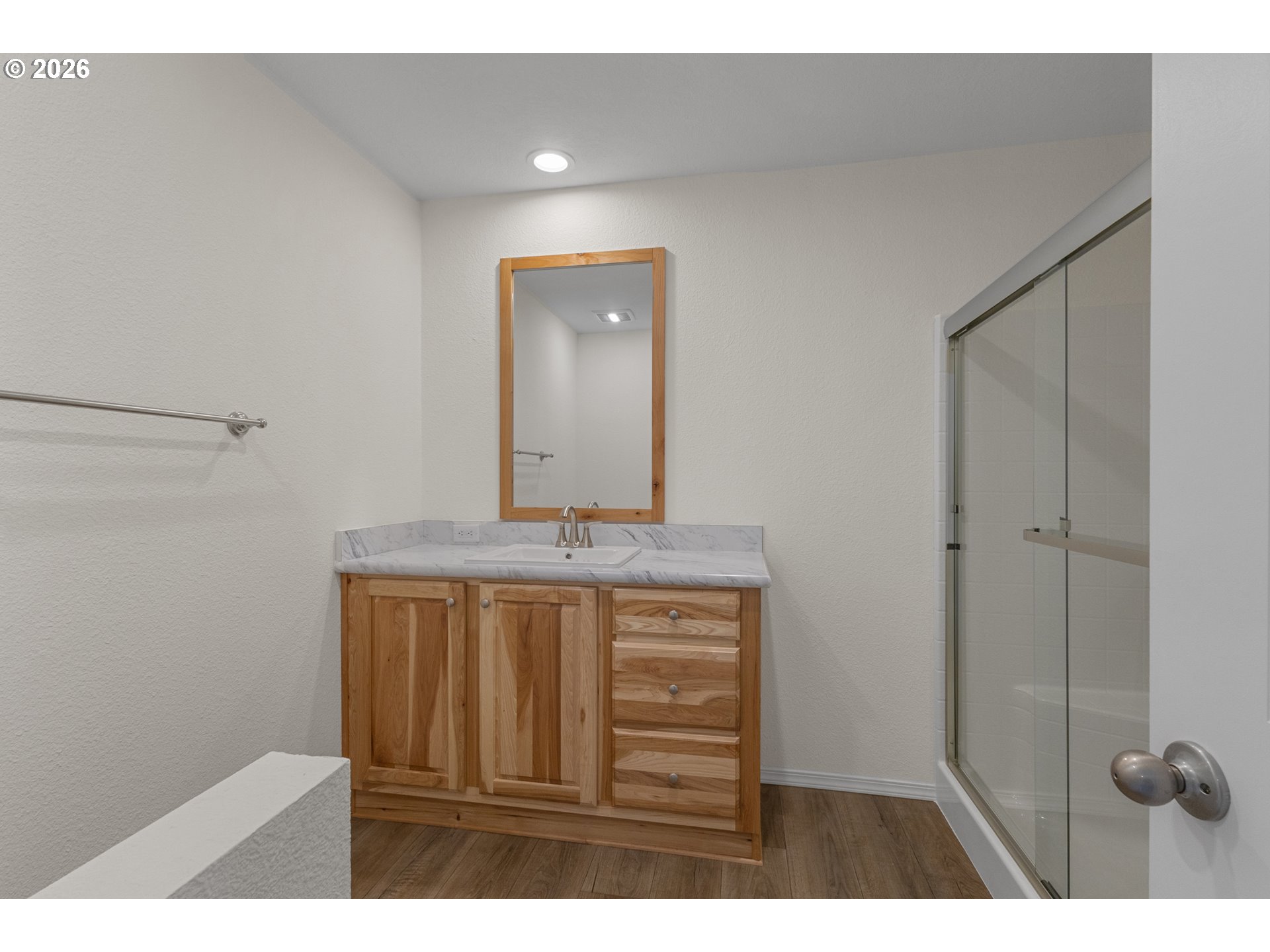 365 Mountain View Road Sweet Home, OR 97386 - Photo 22 of 32 a bathroom with a granite countertop sink a mirror and shower