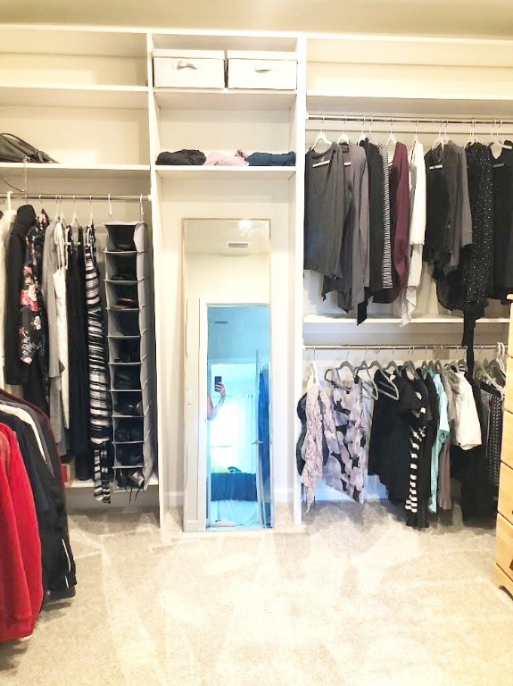 Undisclosed Address Vero Beach, FL 32967 - Photo 6 of 7 a view of walk in closet with clothes and shoes