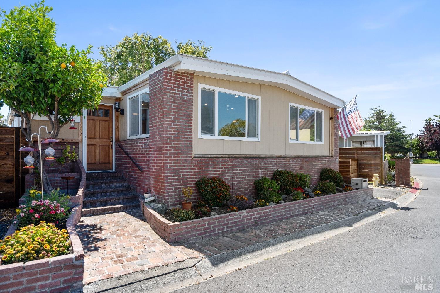 151 Yosemite Road San Rafael, CA 94903 - Photo 1 of 1 a front view of a house with garden