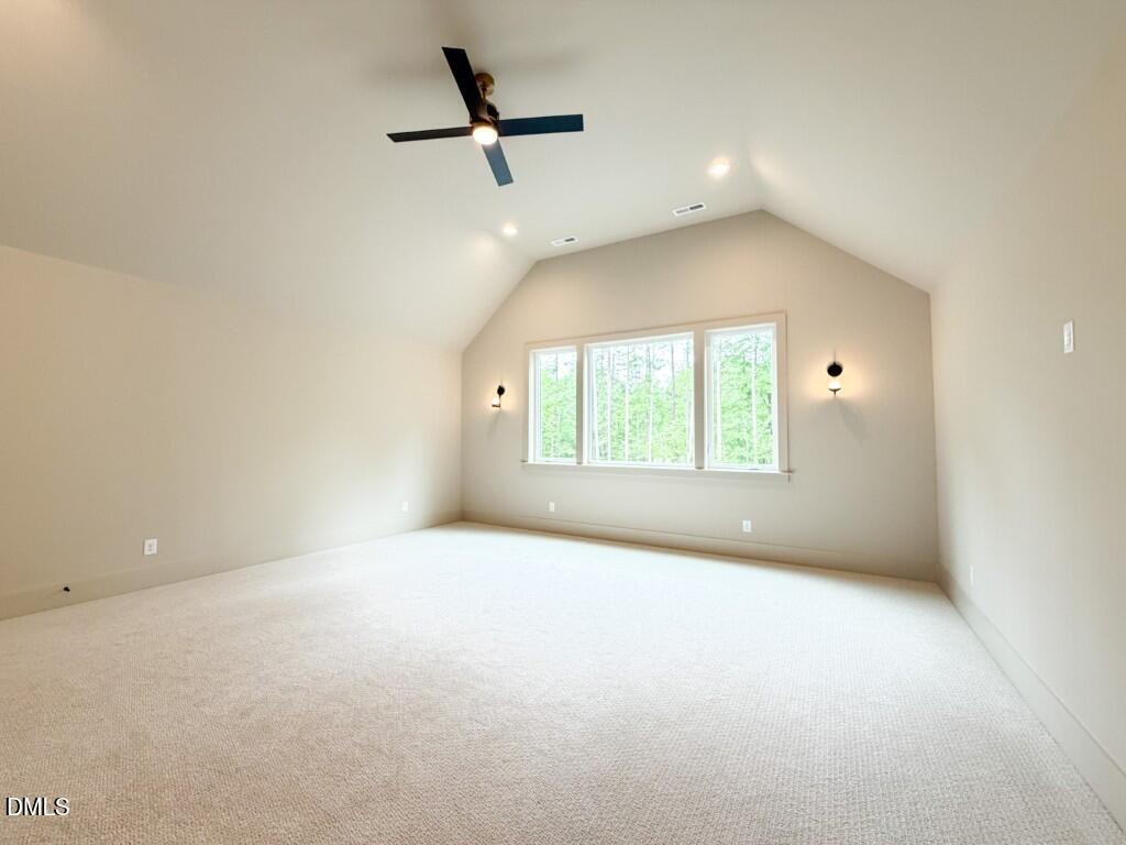 7441 Summer Tanager Trail Raleigh, NC 27614 - Photo 34 of 48 wooden floor in an empty room with a window