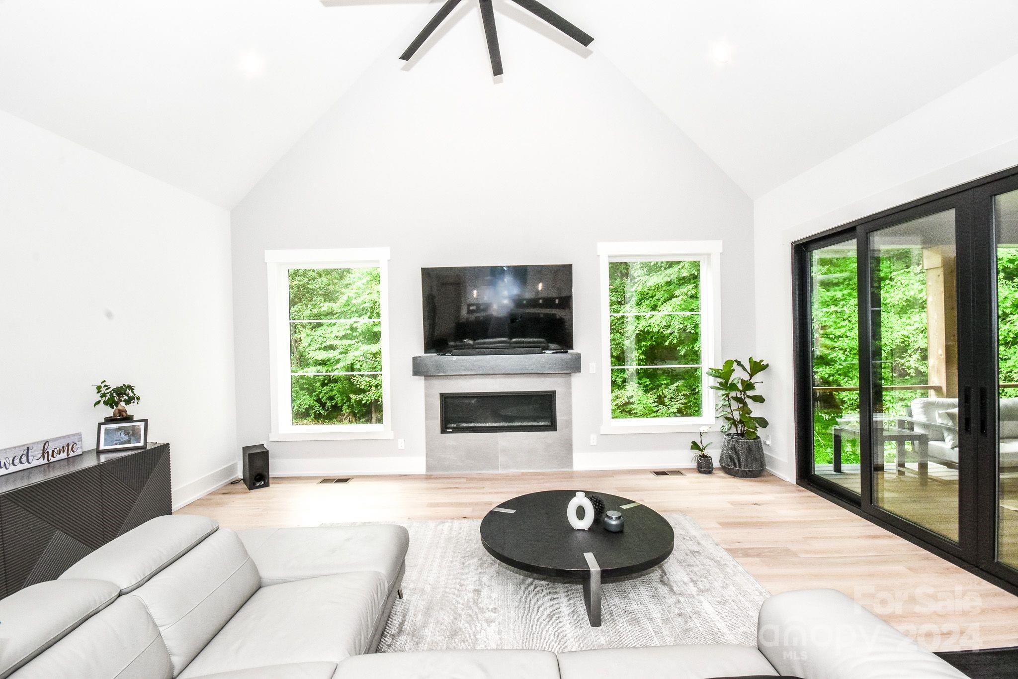 322 Mountainview Drive Charlotte, NC 28270 - Photo 16 of 47 a living room with furniture and a large window