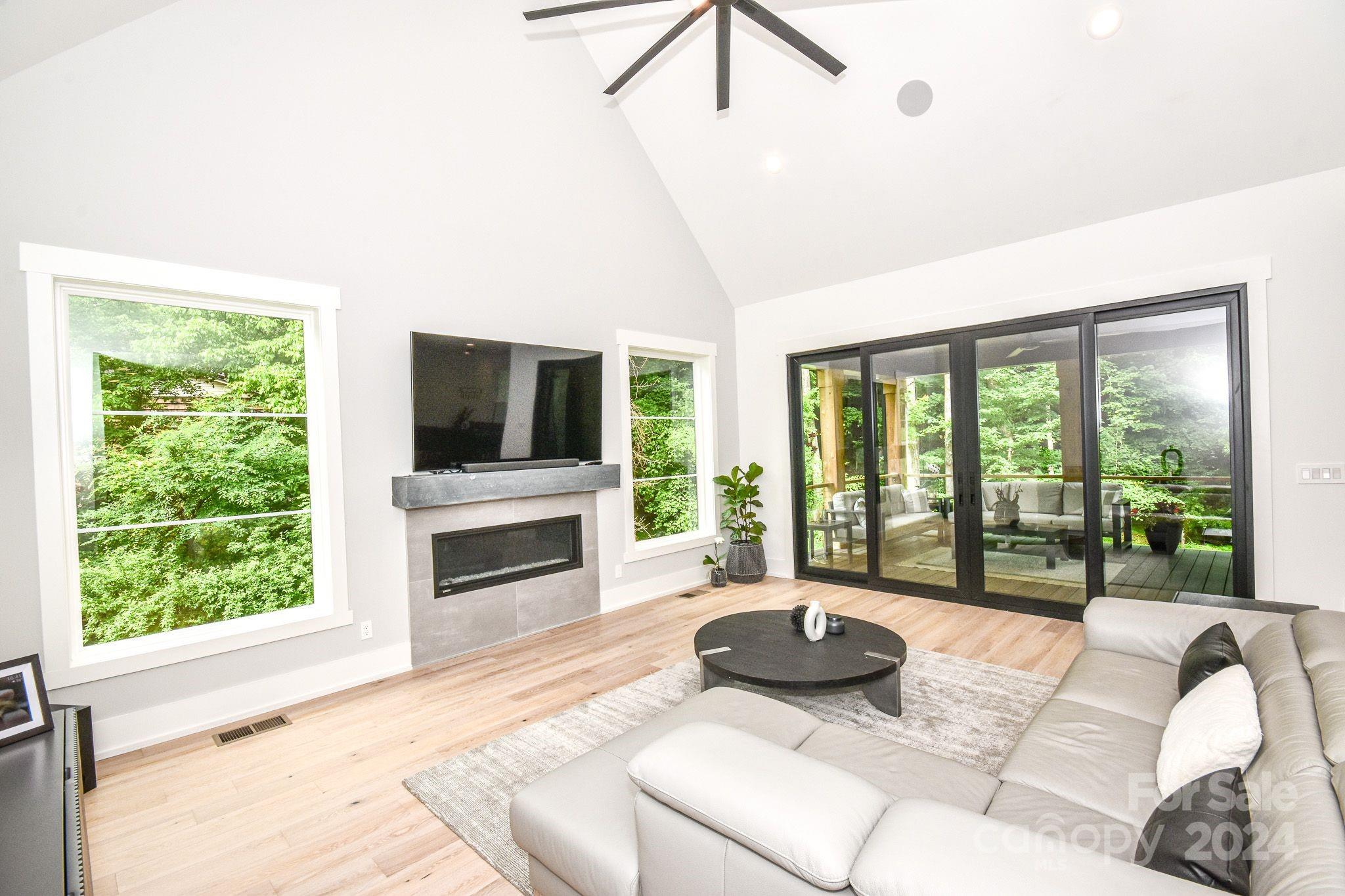 322 Mountainview Drive Charlotte, NC 28270 - Photo 18 of 47 a living room with furniture and a flat screen tv