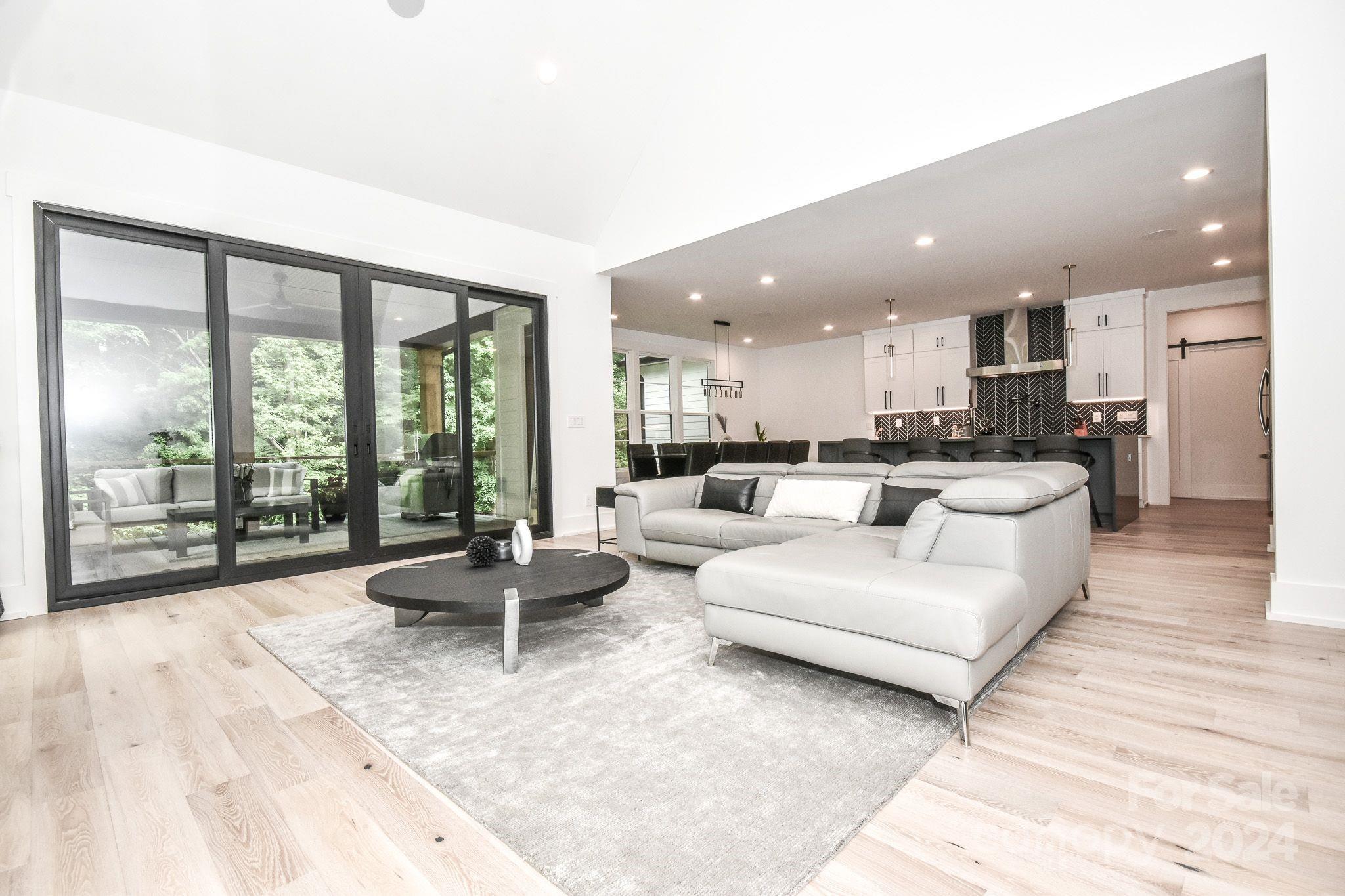 322 Mountainview Drive Charlotte, NC 28270 - Photo 19 of 47 a living room with furniture and a large window