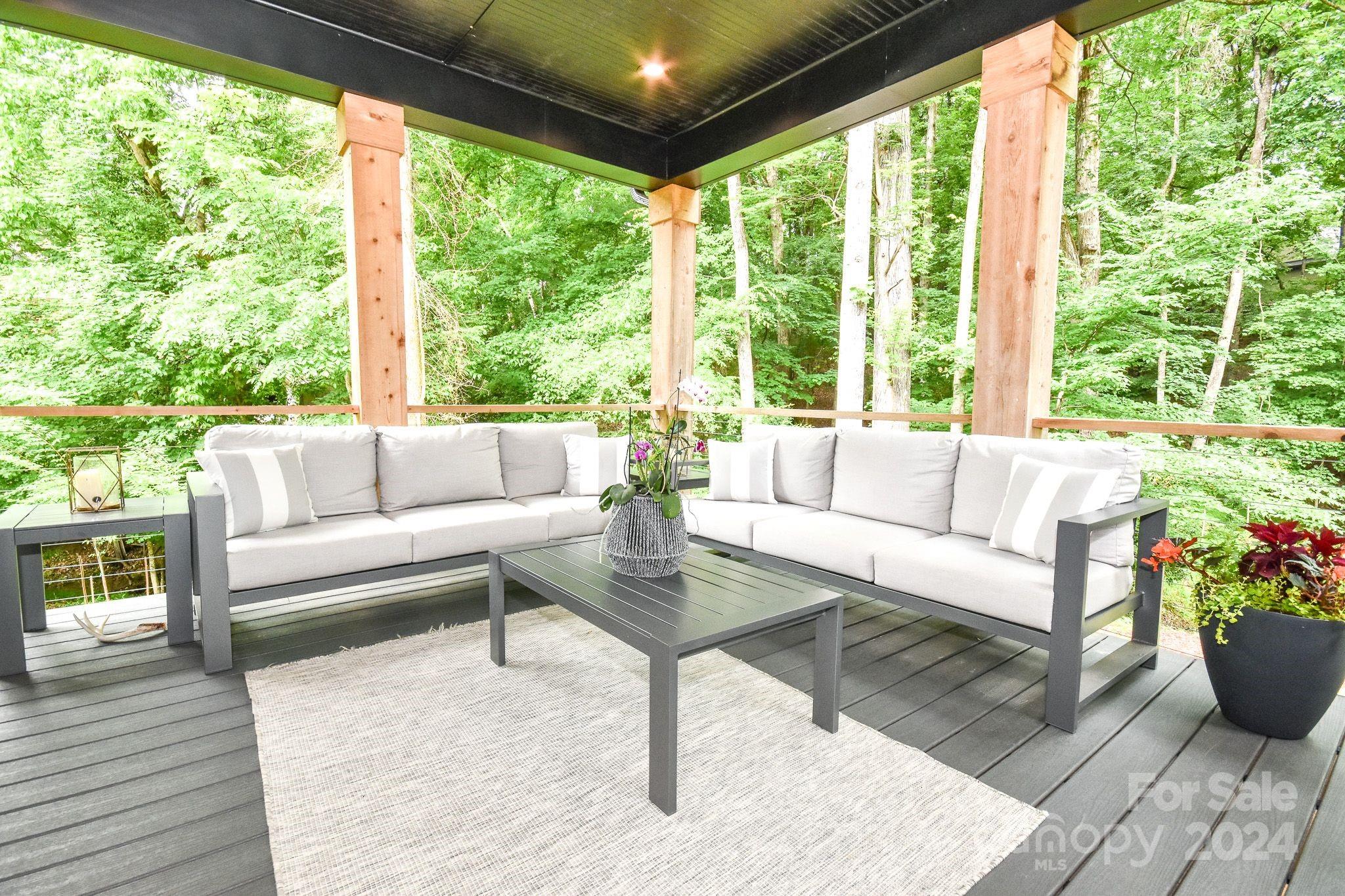 322 Mountainview Drive Charlotte, NC 28270 - Photo 21 of 47 a living room with furniture and a large window