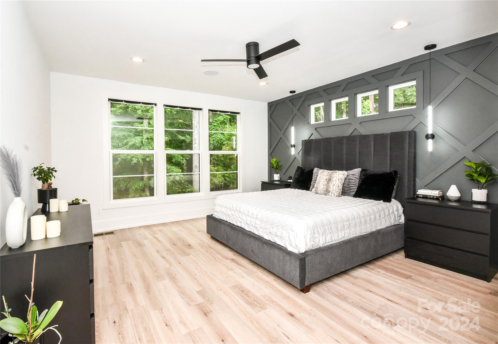 322 Mountainview Drive Charlotte, NC 28270 - Photo 22 of 47 a bedroom with a large bed and a large window