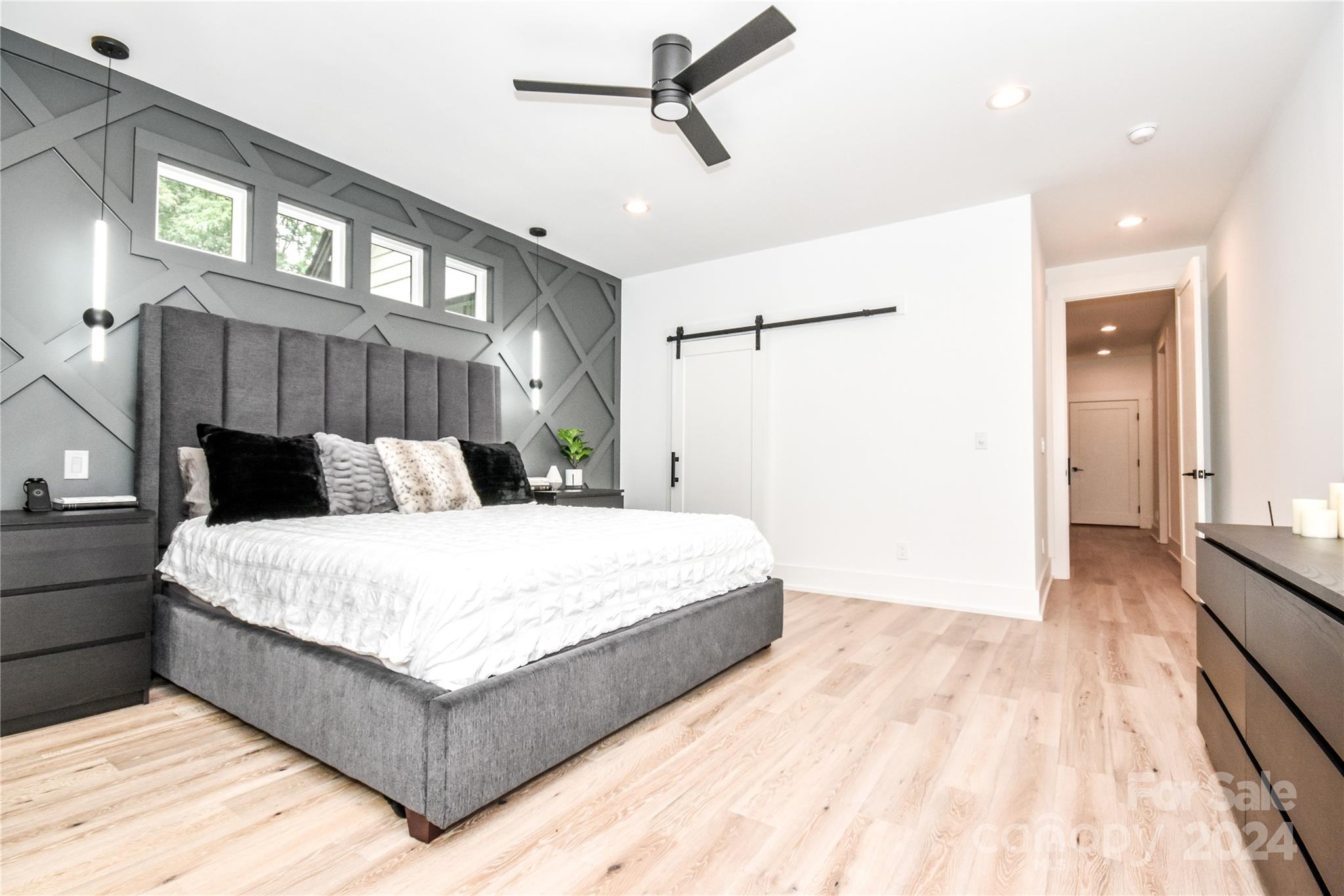 322 Mountainview Drive Charlotte, NC 28270 - Photo 24 of 47 a bedroom with a bed and wooden floor