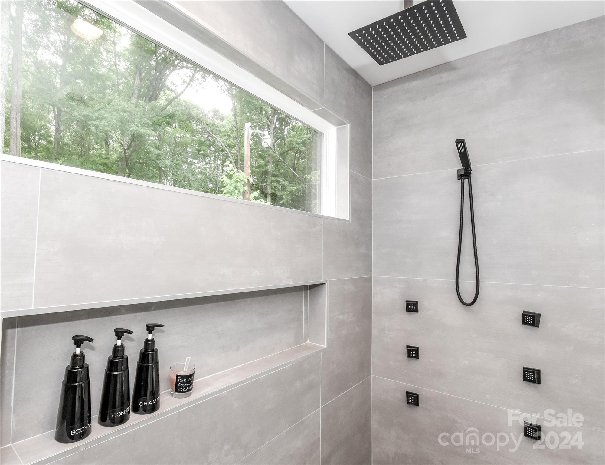 322 Mountainview Drive Charlotte, NC 28270 - Photo 26 of 47 a bathroom with a tub and a window