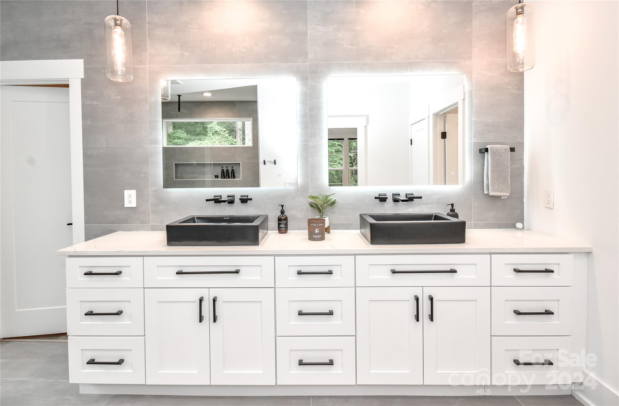 322 Mountainview Drive Charlotte, NC 28270 - Photo 27 of 47 a kitchen with white cabinets and white appliances