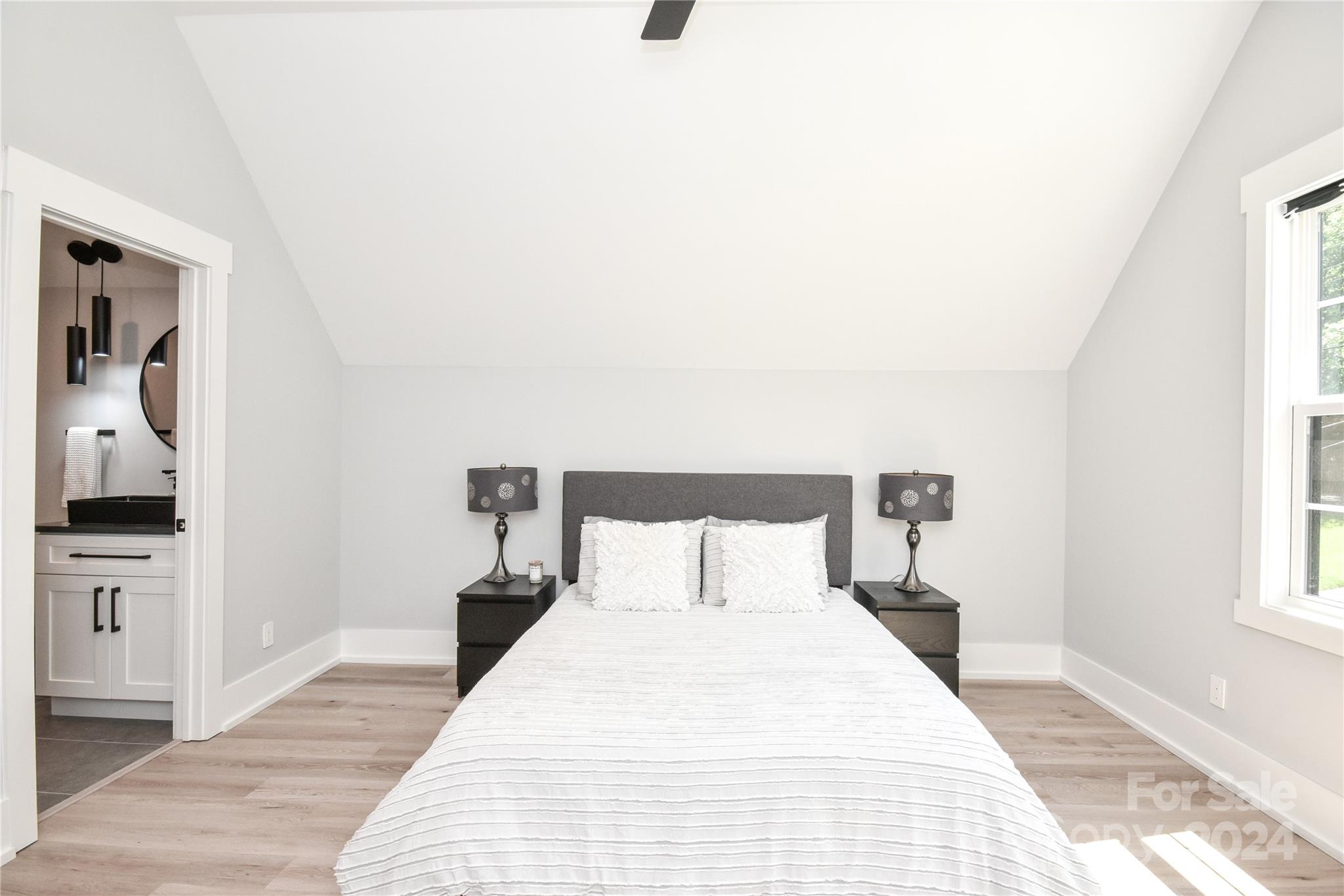 322 Mountainview Drive Charlotte, NC 28270 - Photo 35 of 47 a bedroom with a bed and a window