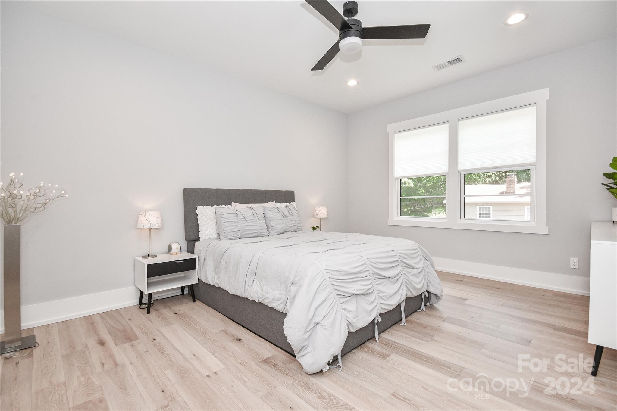 322 Mountainview Drive Charlotte, NC 28270 - Photo 36 of 47 a bedroom with a bed and a window