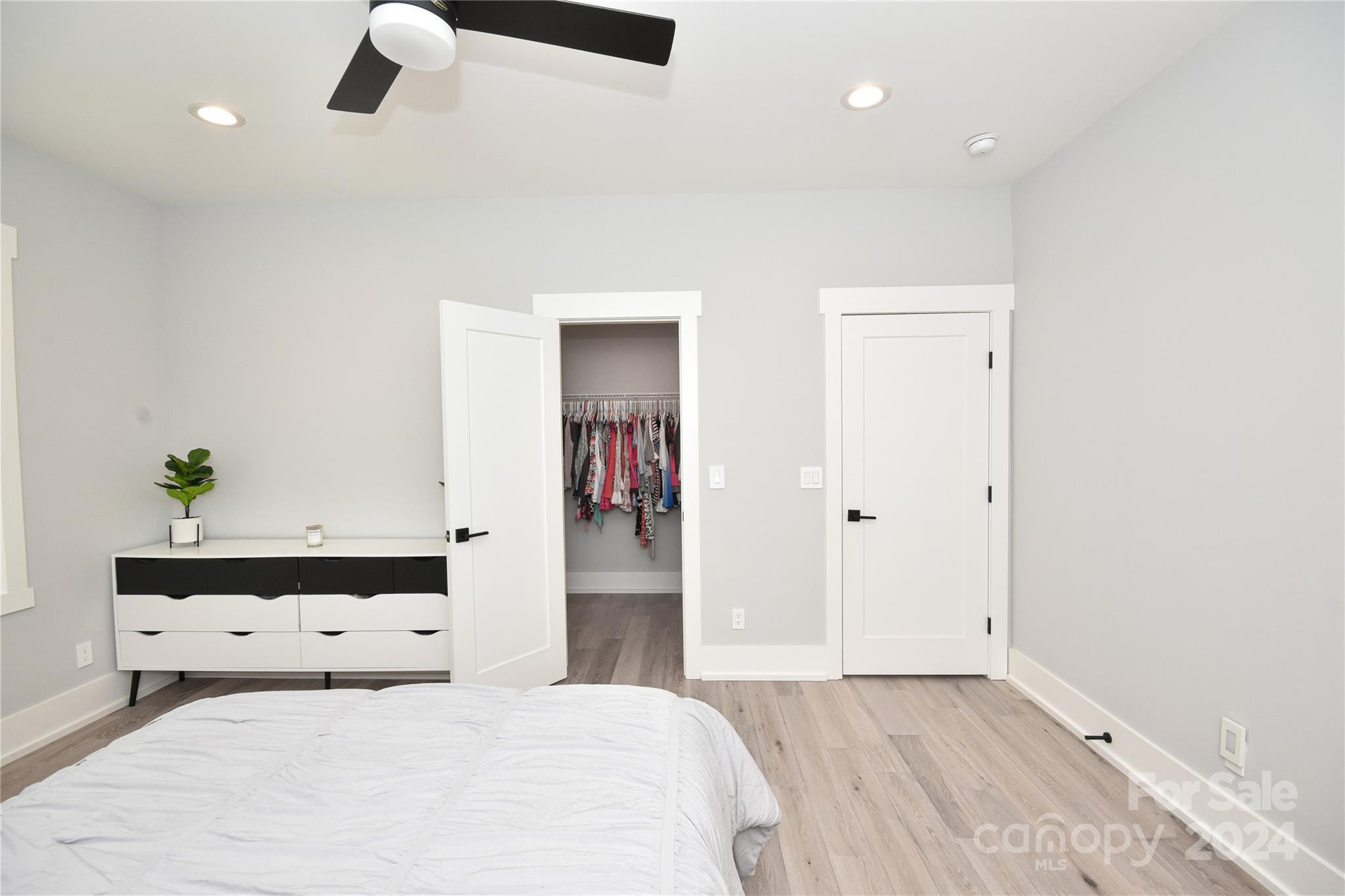 322 Mountainview Drive Charlotte, NC 28270 - Photo 38 of 47 a bedroom with a bed and a cabinets