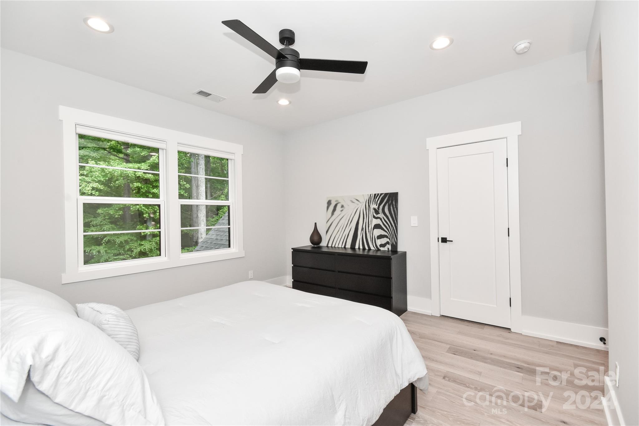 322 Mountainview Drive Charlotte, NC 28270 - Photo 41 of 47 a bedroom with a bed and a window