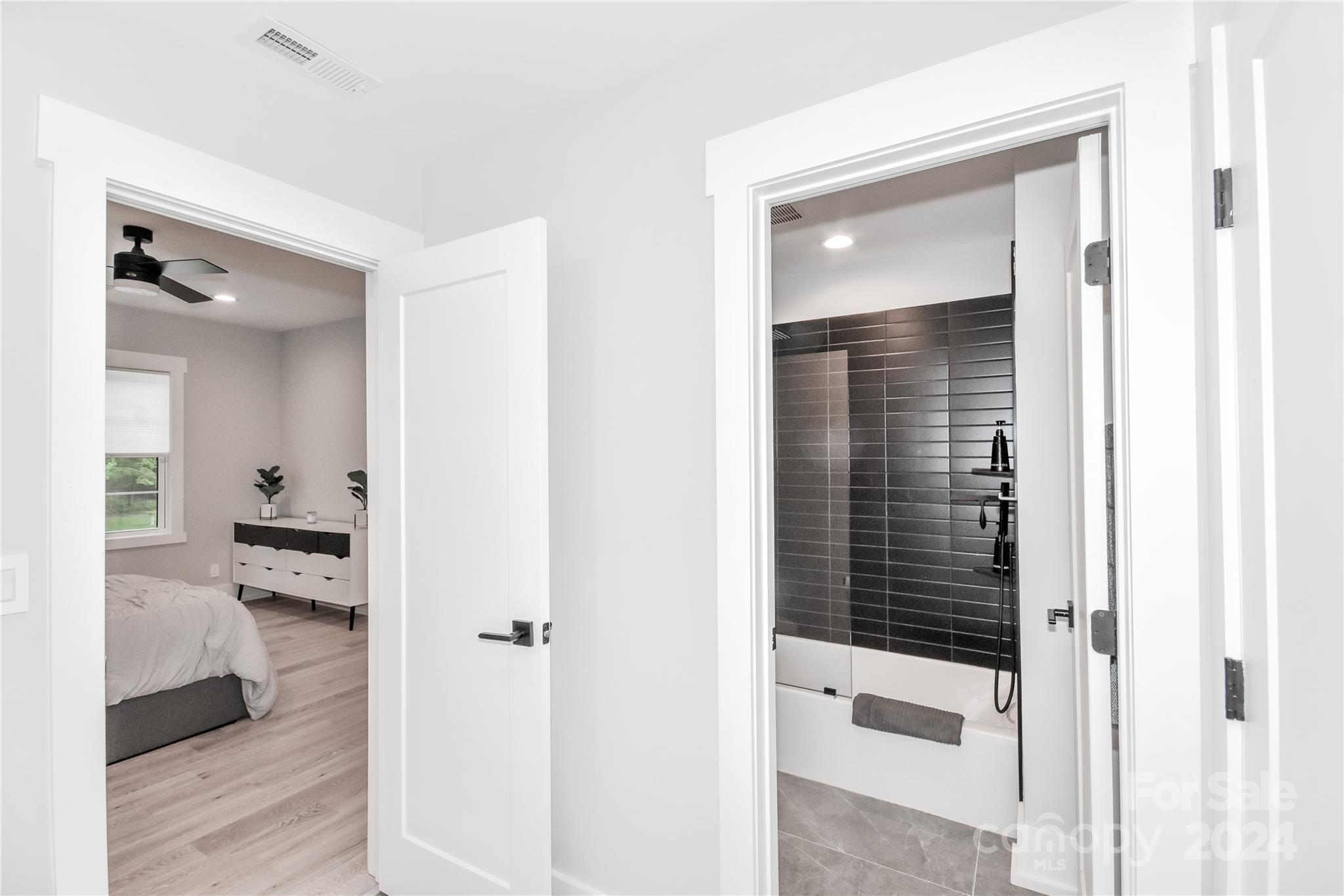 322 Mountainview Drive Charlotte, NC 28270 - Photo 43 of 47 a view of a bathroom from a hallway