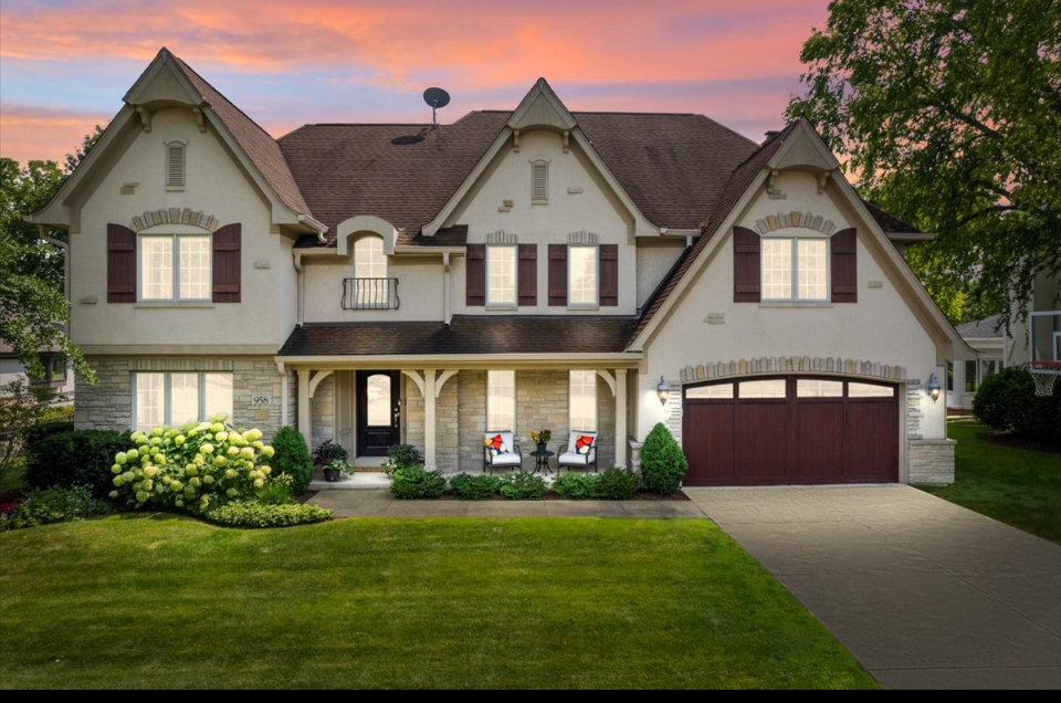 958 West Bauer Road Naperville, IL 60563 - Photo 1 of 57 a front view of a house with a garden