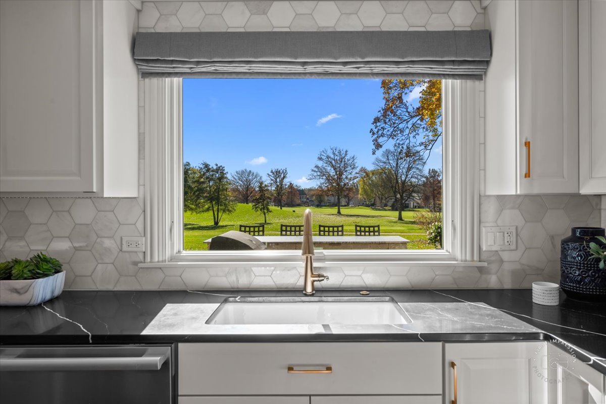 958 West Bauer Road Naperville, IL 60563 - Photo 15 of 57 a kitchen with a sink and a large window