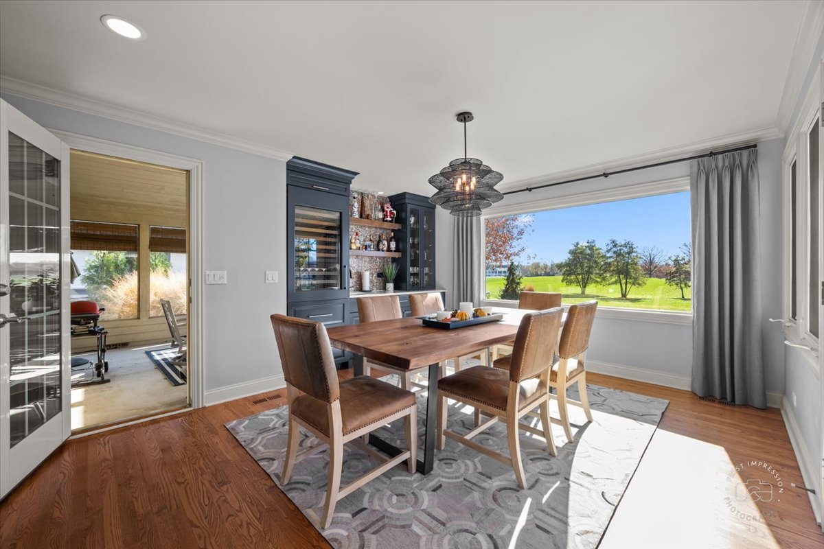 958 West Bauer Road Naperville, IL 60563 - Photo 23 of 57 a view of a dining room with furniture window and outside view
