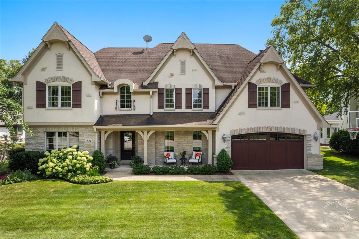 958 West Bauer Road Naperville, IL 60563 - Photo 3 of 57 a front view of a house with a garden