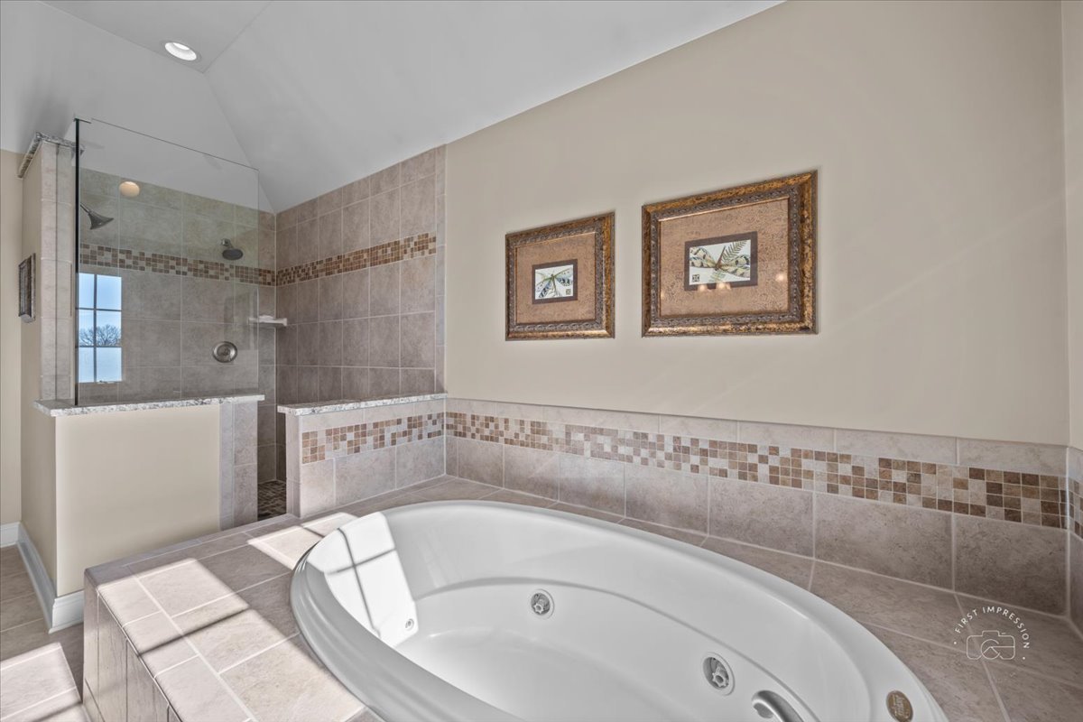 958 West Bauer Road Naperville, IL 60563 - Photo 39 of 57 a bathroom with a tub and a shower