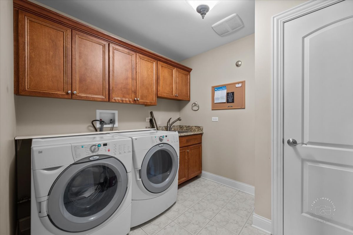 958 West Bauer Road Naperville, IL 60563 - Photo 40 of 57 a utility room with dryer and washer