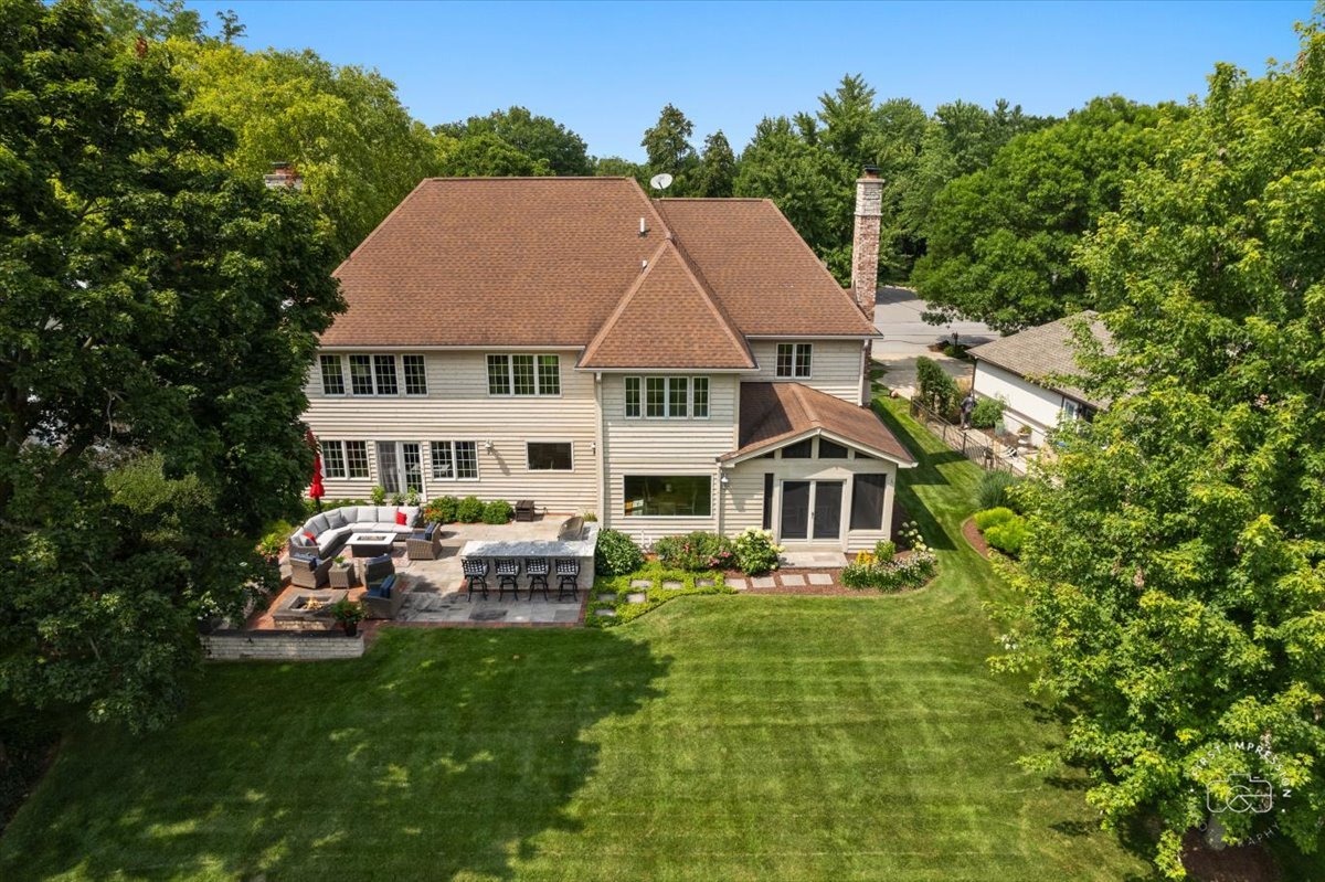 958 West Bauer Road Naperville, IL 60563 - Photo 55 of 57 a aerial view of a house with swimming pool and sitting area