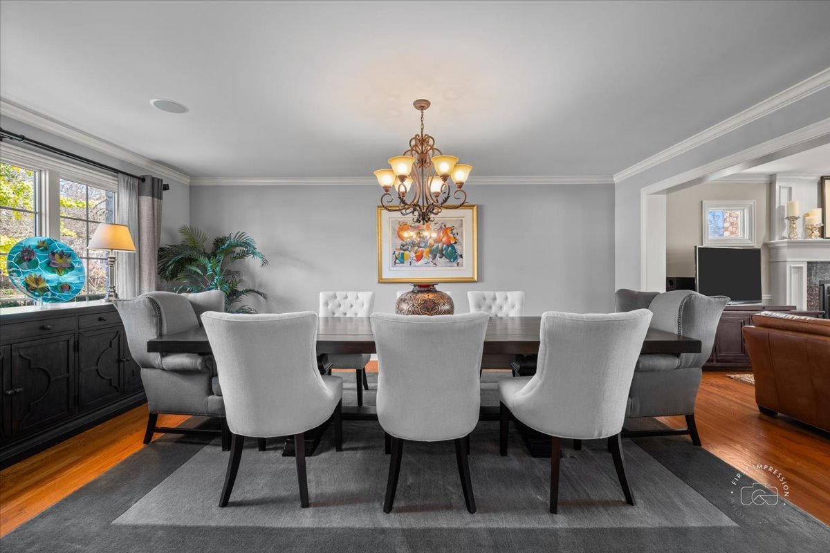 958 West Bauer Road Naperville, IL 60563 - Photo 8 of 57 a view of a dining room with furniture window and wooden floor