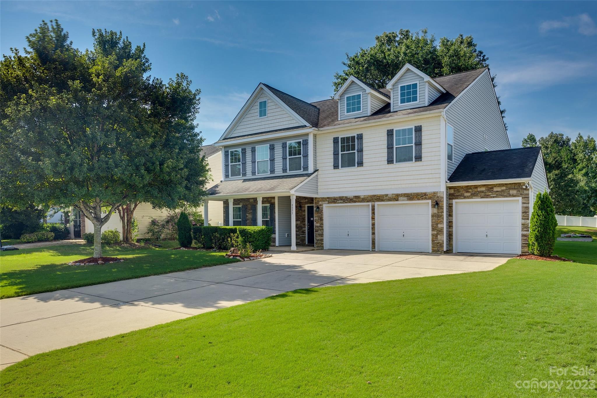 8055 Bryson Road Indian Land, SC 29707 - Photo 1 of 45 a front view of a house with a yard and garage