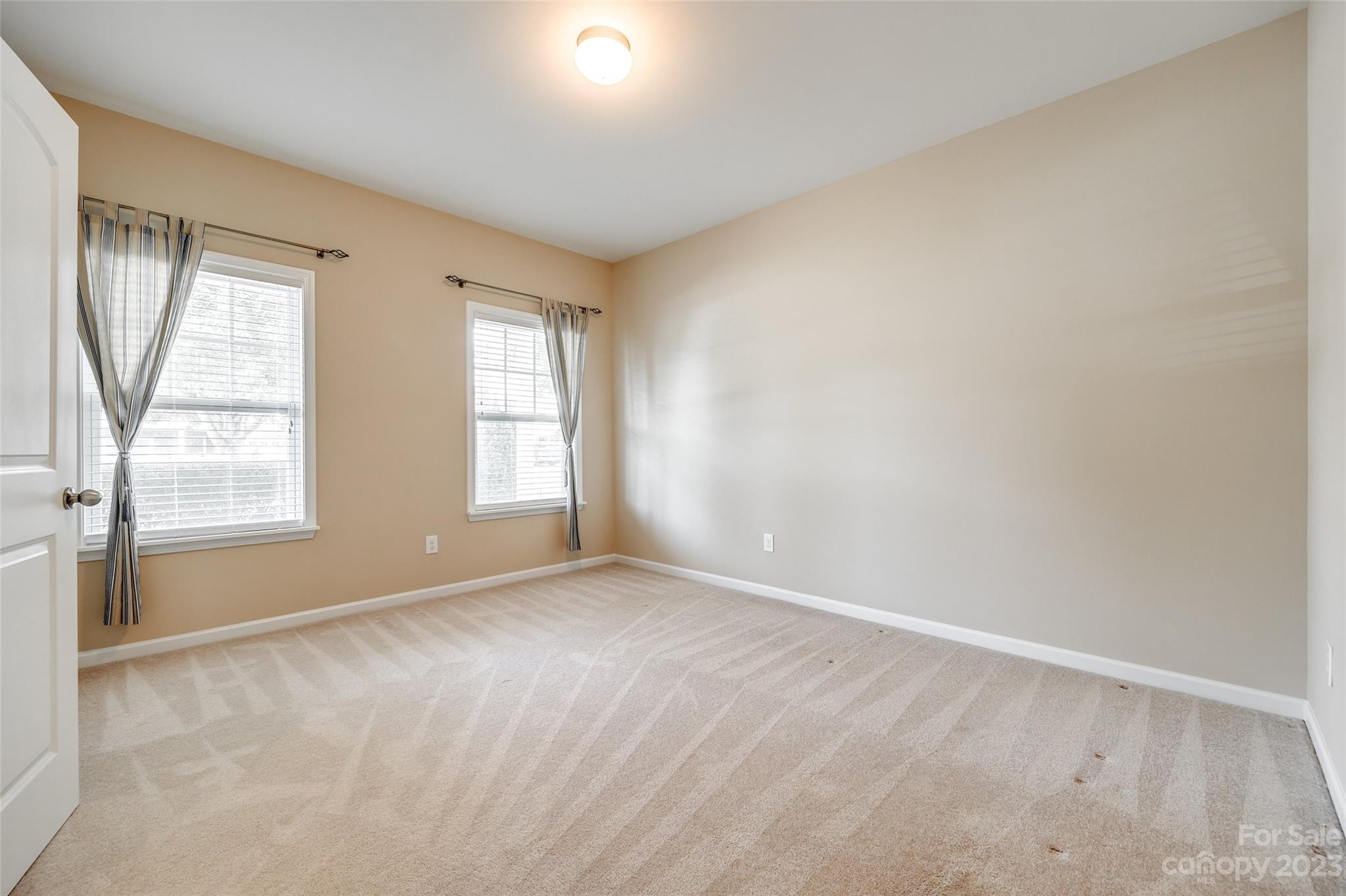 8055 Bryson Road Indian Land, SC 29707 - Photo 30 of 45 an empty room with windows