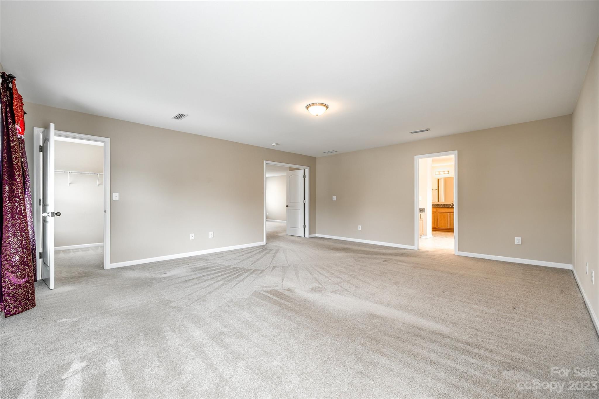 8055 Bryson Road Indian Land, SC 29707 - Photo 39 of 45 a view of an empty room with window and wooden floor