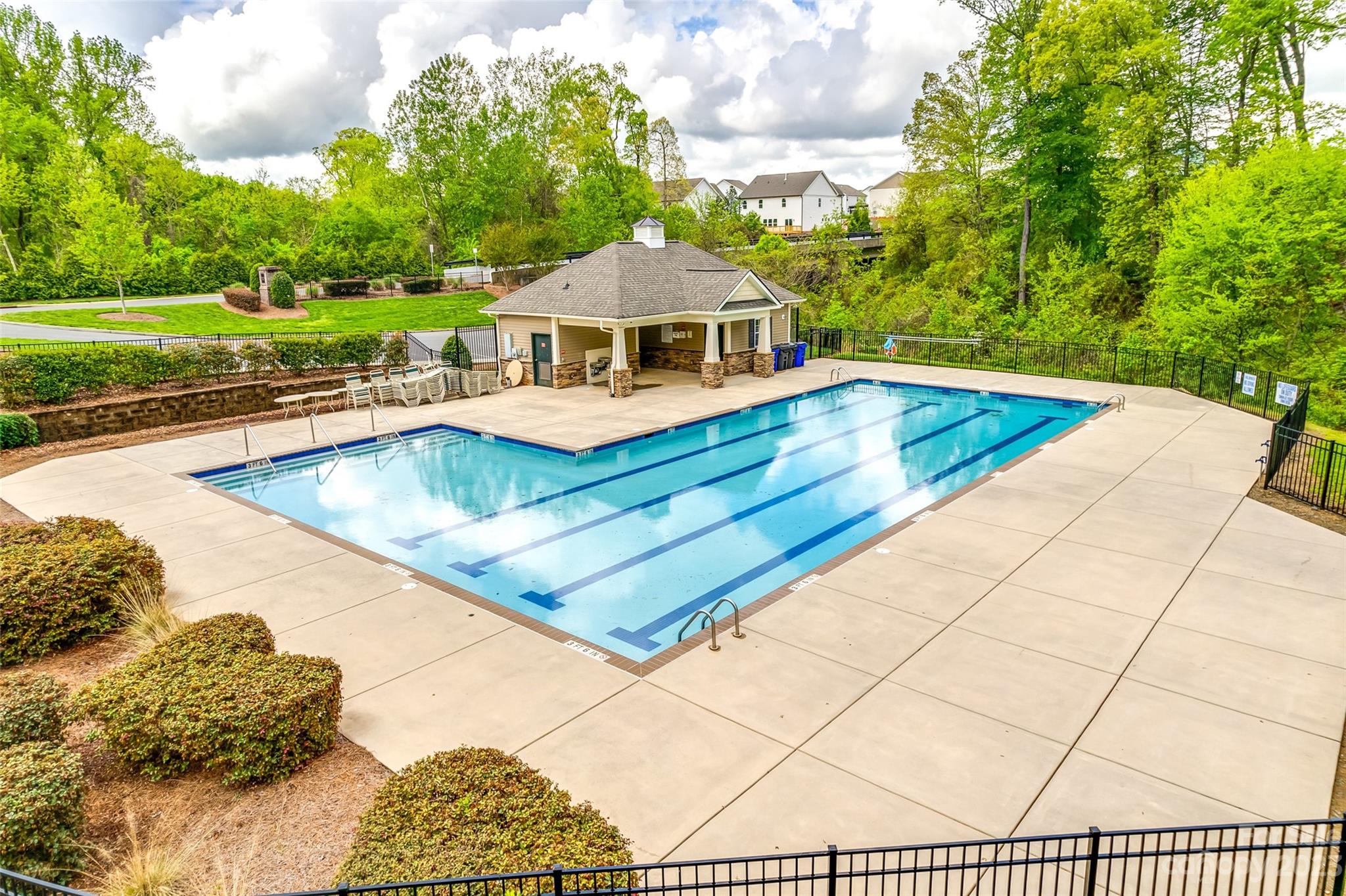 8055 Bryson Road Indian Land, SC 29707 - Photo 42 of 45 a view of a house with a swimming pool