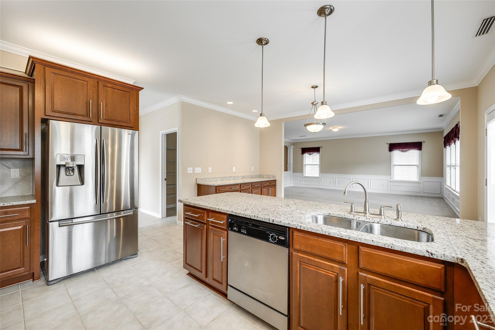 8055 Bryson Road Indian Land, SC 29707 - Photo 8 of 45 a kitchen with stainless steel appliances granite countertop a refrigerator a sink dishwasher a oven and a refrigerator