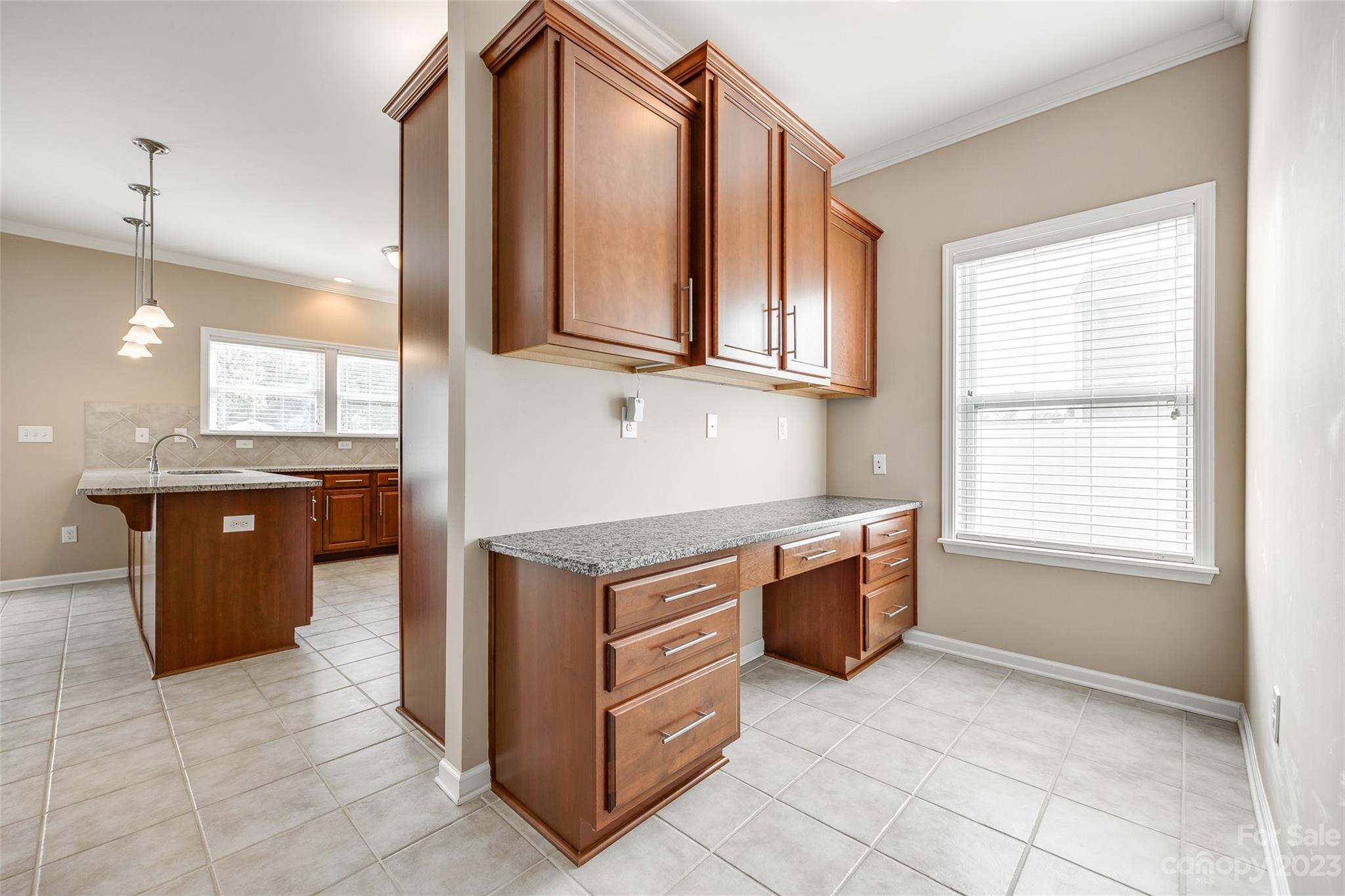8055 Bryson Road Indian Land, SC 29707 - Photo 10 of 45 a kitchen with stainless steel appliances granite countertop a stove and a sink