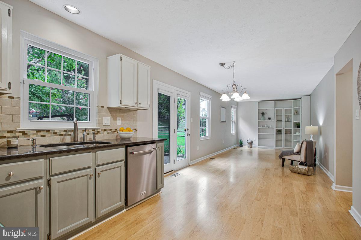 8401 Triple Crown Road Bowie, MD 20715 - Photo 12 of 44 Kitchen opens to family room