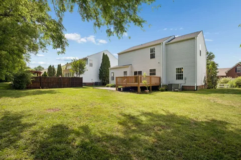 a front view of house with yard and seating area