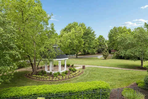 a view of a house with a big yard