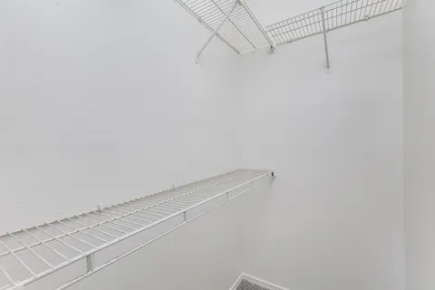 a view of a room with racks on the wall
