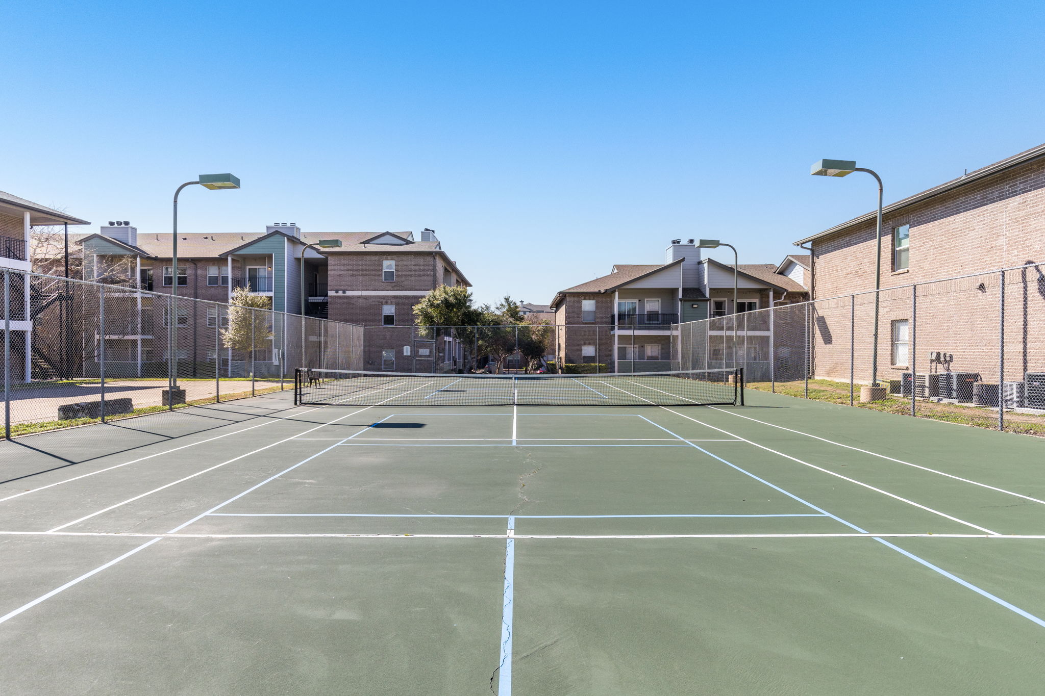 12166 Metric Boulevard, Unit 230 Austin, TX 78758 - Photo 31 of 32 a view of a city with tall buildings