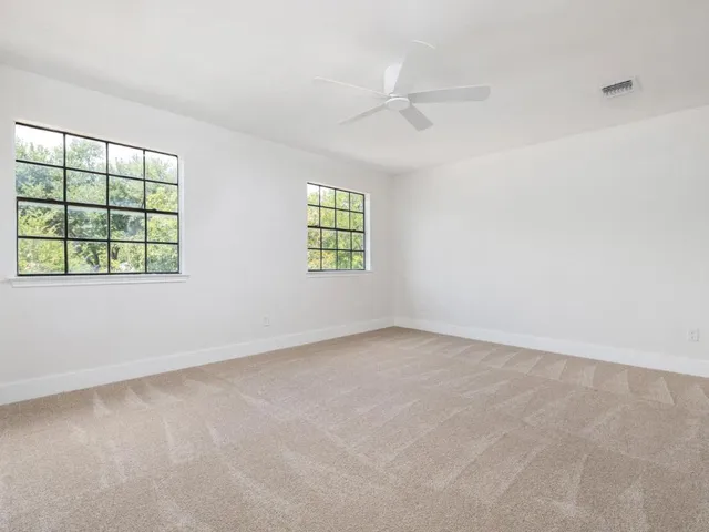 an empty room with windows